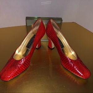 Dark orange snake skin 3in heel pumps